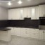 Кухонная мебель  с фасадами МДФ эмалевое покрытие с каменной столешницей и интегрированной мойкой. 1