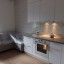 Кухонная мебель  с фасадами МДФ эмалевое покрытие с каменной столешницей и не интегрированной мойкой 1